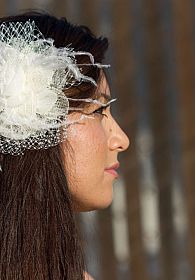 Playful Feathered Flower Comb